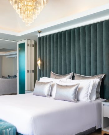 6. Penthouse Suite Bed and living area 6. Penthouse Suite Bed and living area